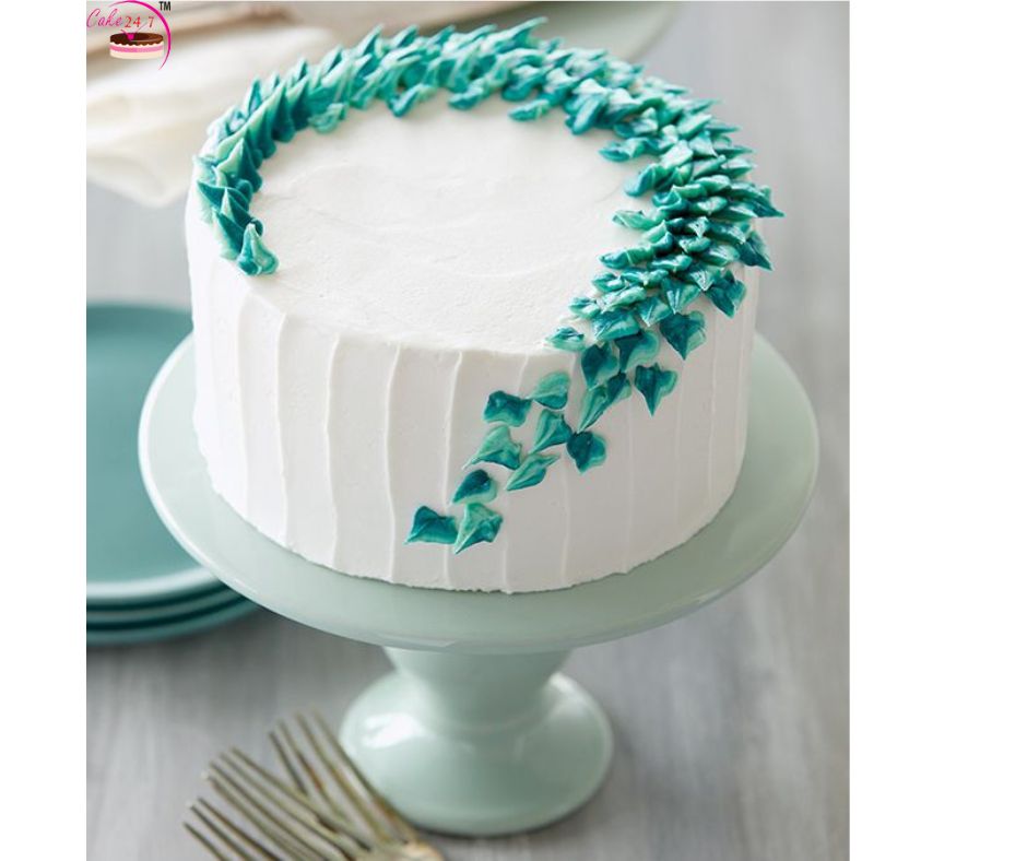 Mint Green Birthday Cake with pink flowers Goodies Bakeshop